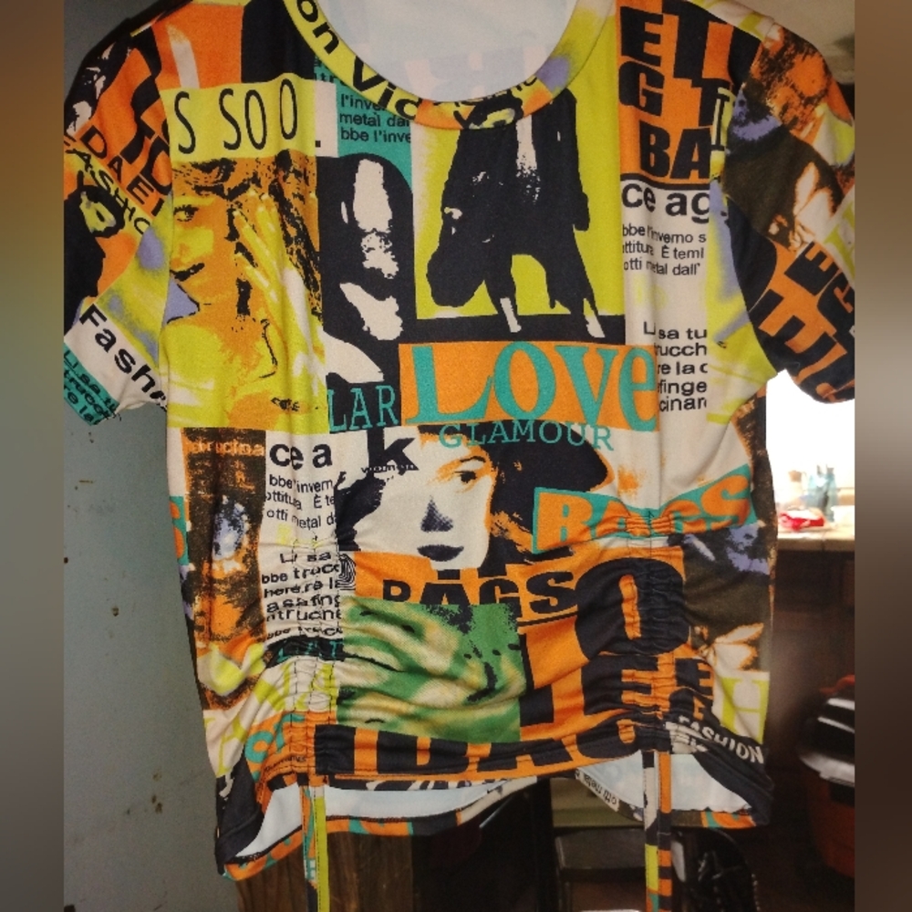 Vibrant Yellow and Orange Crop Top with Graphic Design